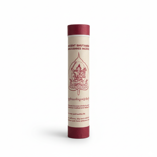 Cylindrical container of Bhutanese incense with red and white design on a white background