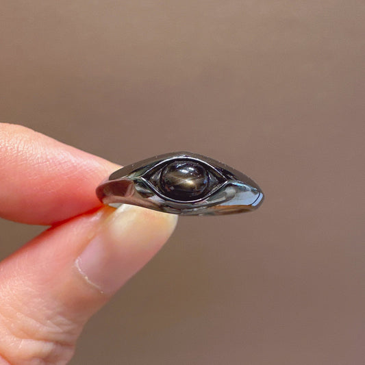 Black Star Sapphire oval cabochon ring in 925 silver