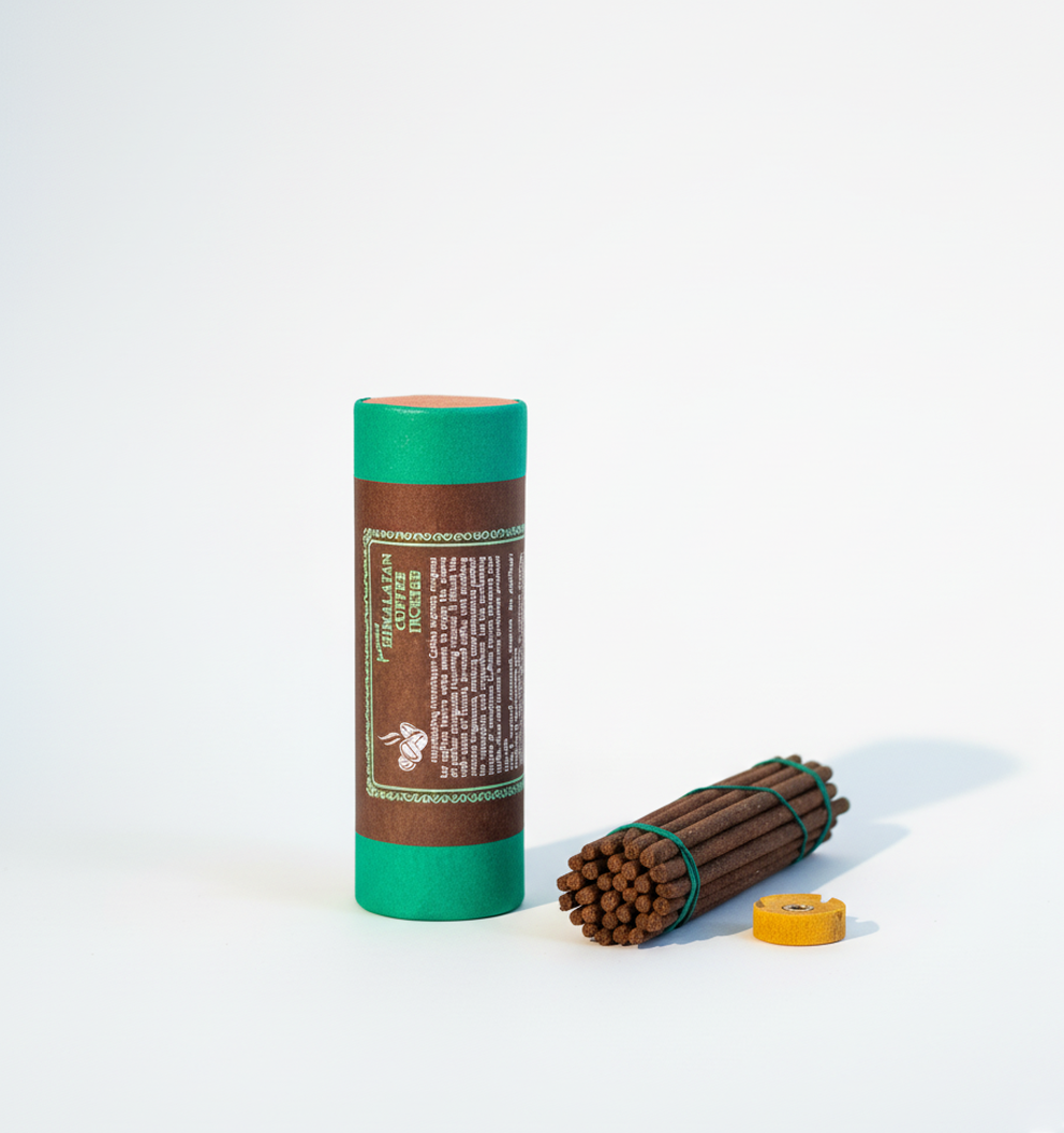 Cylindrical green and brown product with wooden sticks on a white background