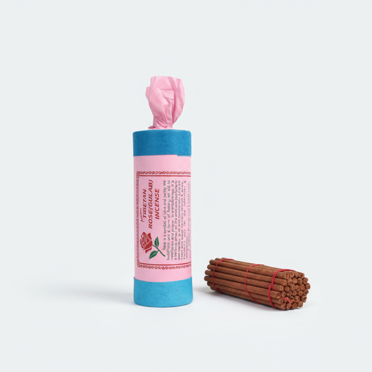Incense stick roll with pink top and blue bottom on a white background