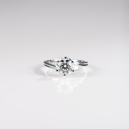 Diamond ring on a light gray background