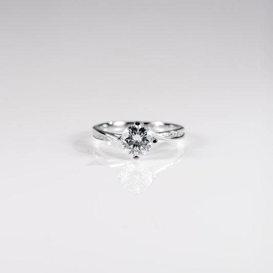 Diamond ring on a light gray background