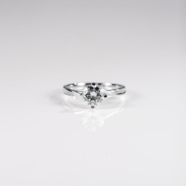 Diamond ring on a light gray background