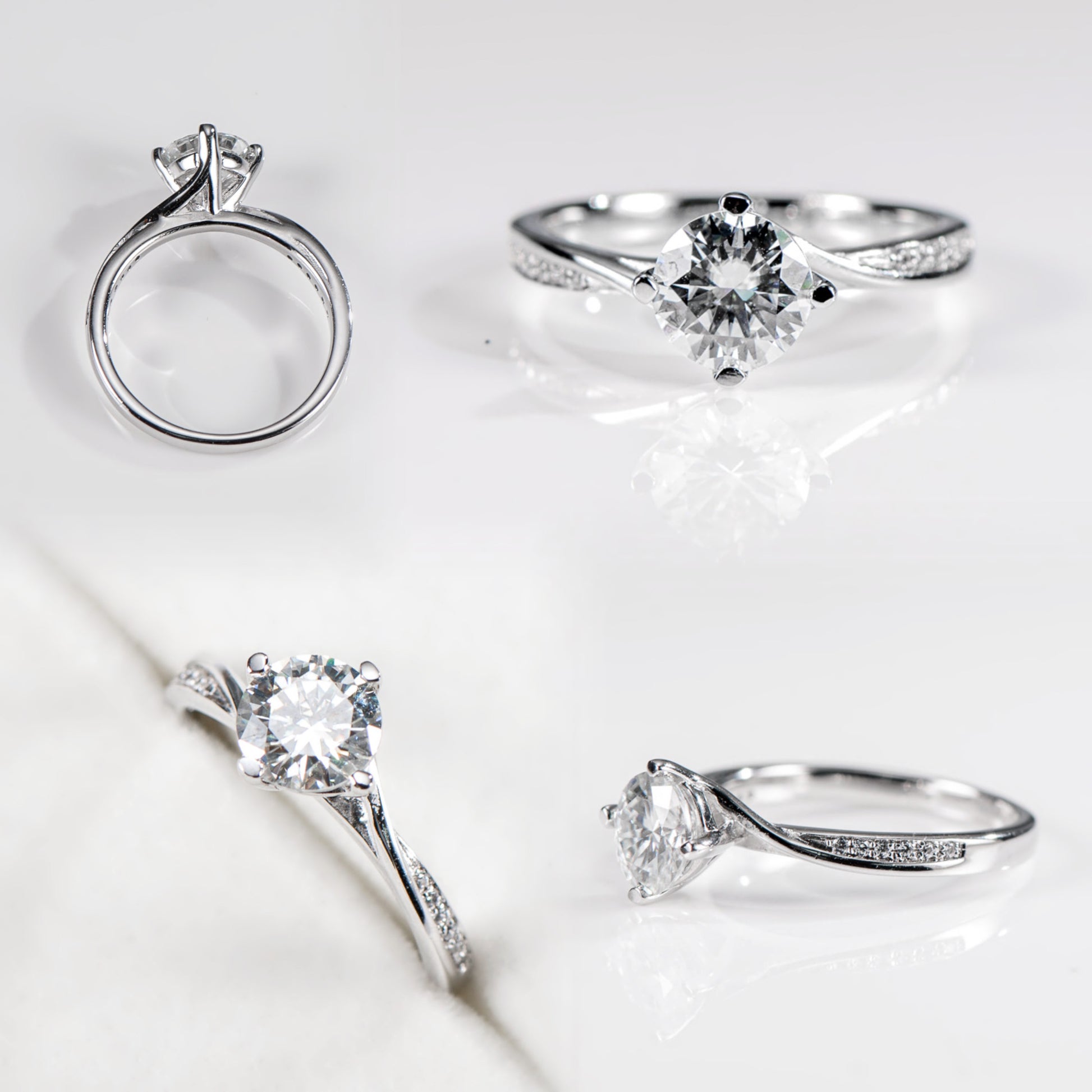 Set of diamond rings on a light gray background