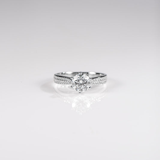 Diamond ring on a light gray background