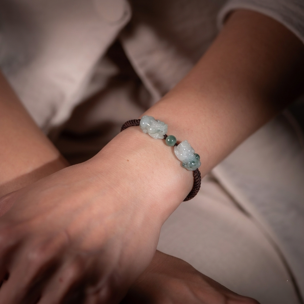 Close-up of a wrist wearing a bracelet with a blurred background