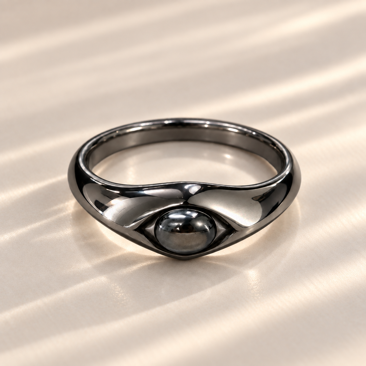 Black star sapphire oval cabochon ring in 925 sterling silver, front view