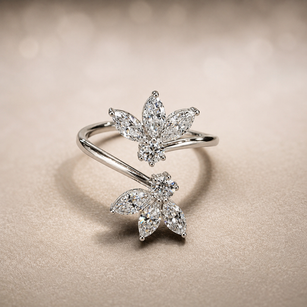 White gold spiral wrap ring with two diamond flower clusters of marquise and round lab-grown diamonds, front angled view