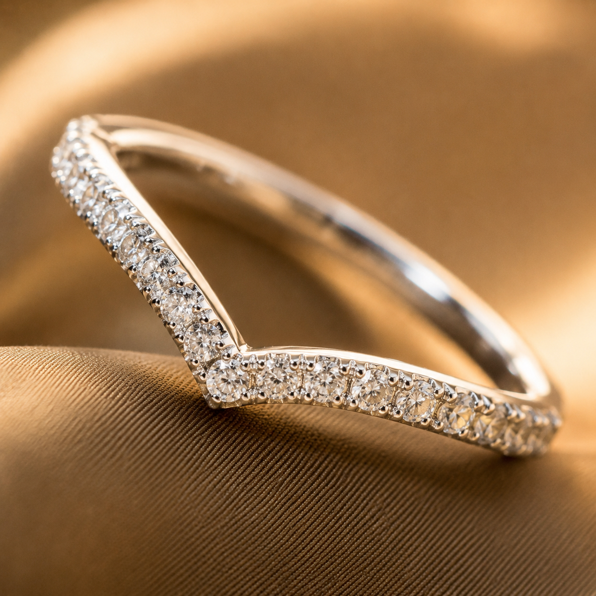 Kairos pavé diamond chevron band — close-up angled detail view