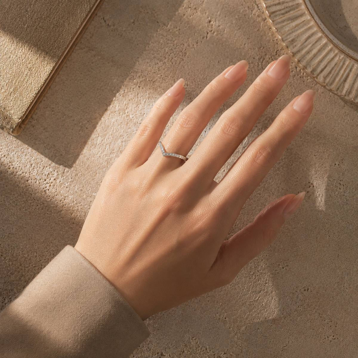Kairos pavé diamond chevron ring worn on hand