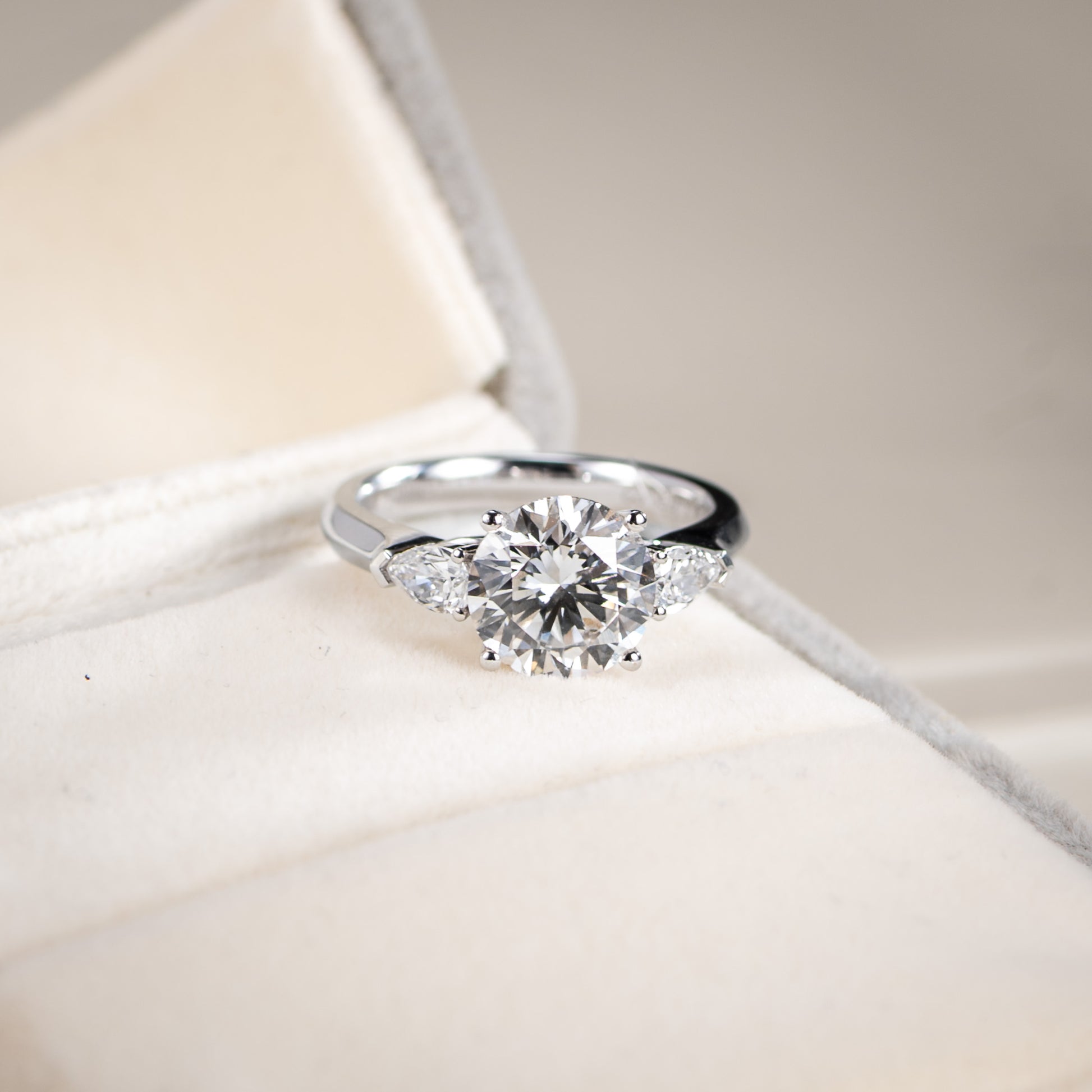 Diamond ring on a soft white background