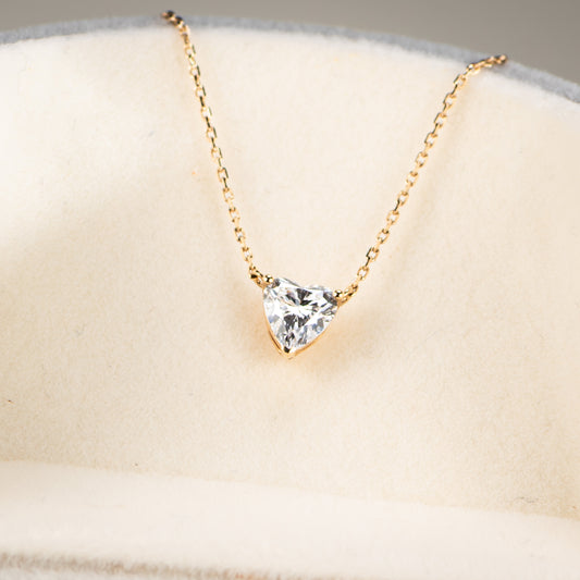 Aurora heart pendant with 0.55ct lab-grown diamond in prong setting on a fine yellow gold chain, front view